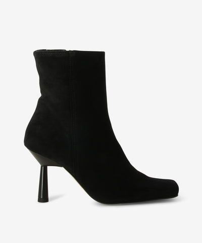 Black suede ankle boot by Alohas. It has an inner zip fastening and features stiletto heel and a soft square toe.