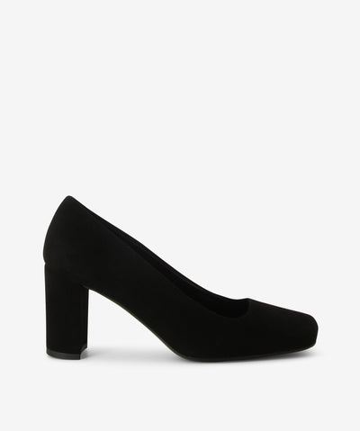 Black suede pumps with a slip-on style and features a block heel and an anatomic square toe.