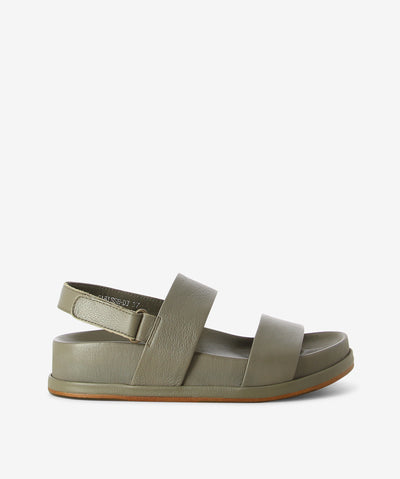 Olive leather strap sandals by Django & Juliette. It has slingback ankle velcro fastening and features a moulded footbed with think platform and an almond toe.