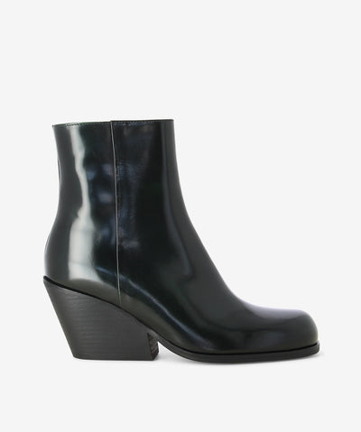 Dark green patent leather boots by Beau Coops. It features a side zip closure, Cuban heel, and a round toe.