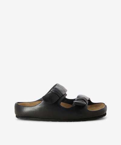 Black leather sandals by Sempre Di. It is a slip-on style with padded body and straps, a suede moulded footbed and a soft square toe.