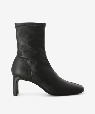 Black leather ankle boots by Siren. It features a thin rectangular heel, inner zip fastening, and a soft square toe.