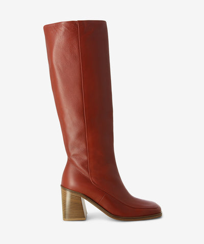 Brown leather knee high boots with an inner zip fastening and features a layered heel and a soft square toe.