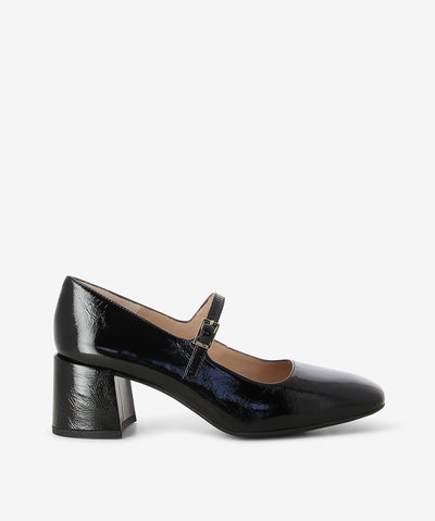 Black crinkled leather mary-jane by Unisa. Is a slip-on style features an adjusted pin-buckle thin strap with a block heel and a soft square toe.