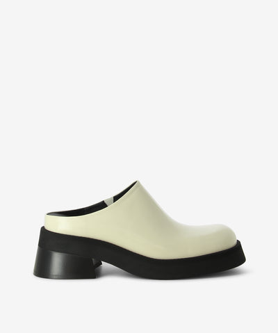 Beige leather mule meets clog by Miista. A slip-on style and features with a discreet elastic gusset, a medium block heel and a round toe.