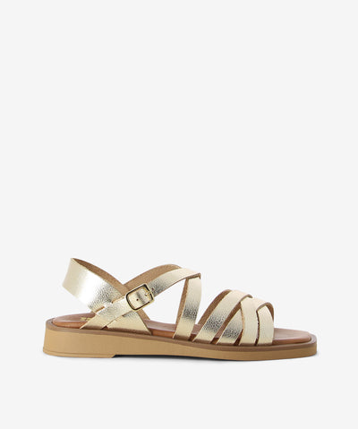 Champagne metallic leather sandals by Nu by Neo. It has an ankle strap with an adjustable pin-buckle fastening and features a strappy upper, extra cushioned footbed and a soft square toe.