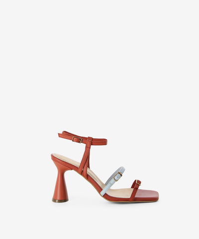 Rust with a hint of baby blue leather sandals by Epoche Xi. It has an adjusted ankle sling back pin-buckle strap and features a double strap upper with an hourglass heel and a soft square toe.