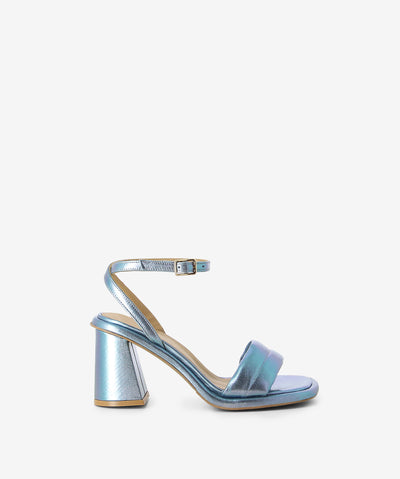 Blue metallic leather sandals by Epoche Xi. It has a wrap-around ankle pin-buckle strap and features a padded upper with block heel and a soft square toe.