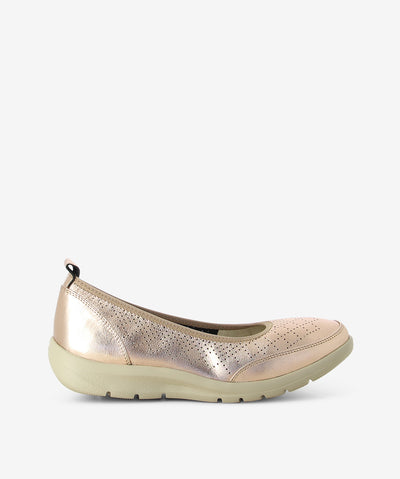 Nude metallic leather ballet flats by Martini Marco. It features an elasticated upper, rear pull tab, and a round toe.