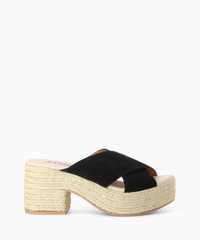 Black suede espadrille sandals with crossover suede straps, a platform sole and a round toe.