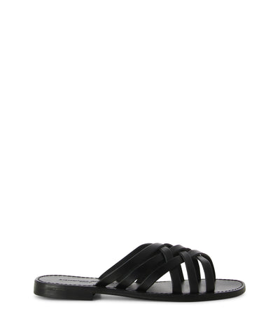 Strappy black Italian leather sandals is a slip-on style featuring crisscrossed straps, a short-stacked heel, and a round toe by L'Artigiano Del Cuoio.