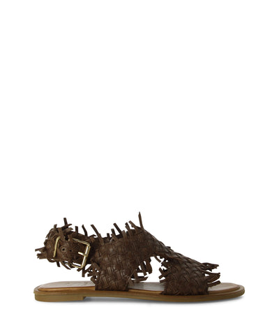 Dark brown cross-over sandals with frayed woven cross-over straps, an ankle buckle fastening, and a round toe by Sempre Di. 
