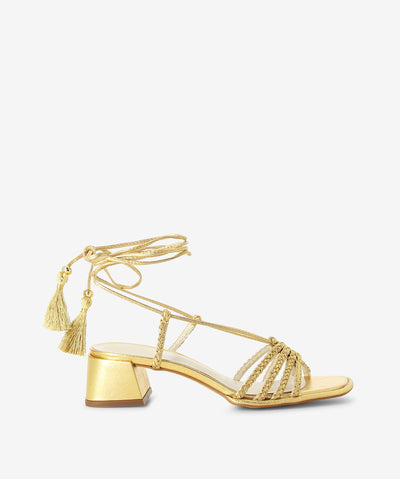 Gold leather sandals with an ankle tie fastening and featuring a braided strappy upper, tassel detail and a soft square toe.