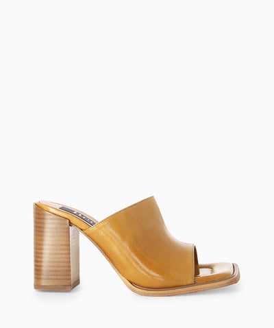 Tan leather mules with a subtle crinkled finish, block heel and a square toe.