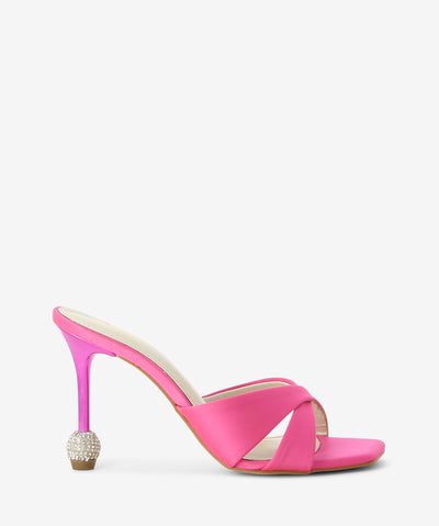 Pink satin heels featuring a stiletto heel with glitterball detail, a crossover upper and a soft square toe.