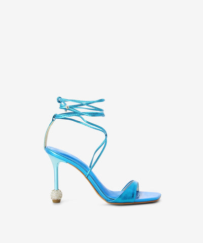 Metallic blue heels with an ankle tie fastening and featuring a stiletto heel with glitterball detail and a soft square toe.
