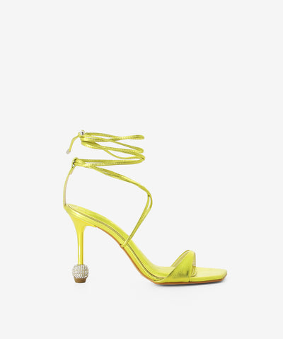 Metallic citrus heels with an ankle tie fastening and featuring a stiletto heel with glitterball detail and a soft square toe.