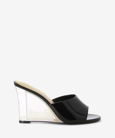 Black wedges with a transparent wedge heel, perspex strap and an almond toe.