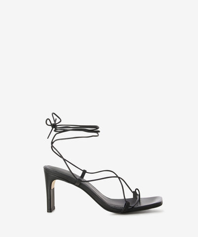 Black leather heels with tie-up ankle fastening and features a slender heel and a soft square toe.