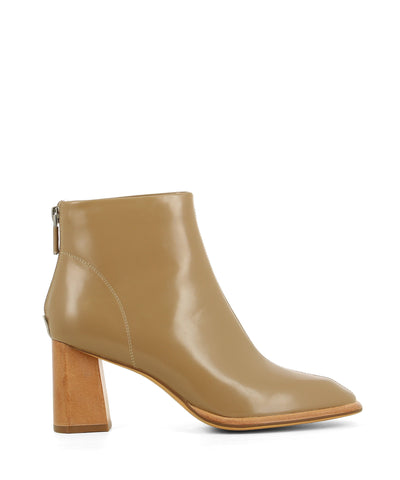 A khaki leather ankle boot featuring a square toe and a contrasting 7cm block heel. Made by Neo X. This style runs true to size.   