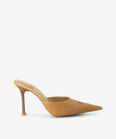 Tan leather Western mules with stud and eyelet detailing, a stiletto heel and a pointed toe by Jeffrey Campbell.