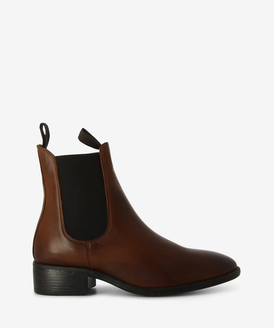 Dark tan leather Chelsea boots featuring elastic gussets, pull tabs and a low stacked heel.