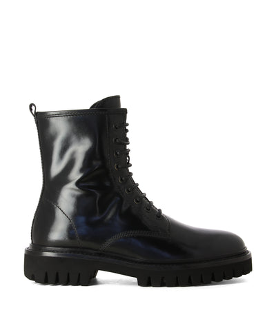 Black chunky leather tread sole lace up boots by Elvio Zanon.