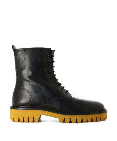 Chunky tread lace up leather boots with contrast mustard sole by Elvio Zanon.