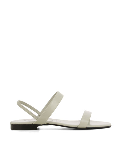 A chic bone coloured leather sandal that has a slingback ankle strap and features a short block heel and an open square toe by 2 Baia Vista.