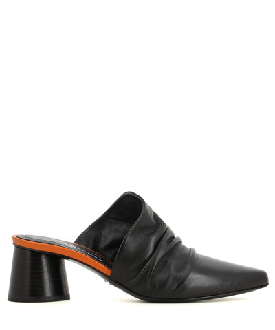 A black leather mule with a block heel and a slouched upper.