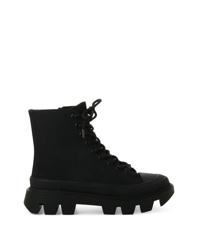 Black hiking style boots featuring a durable canvas upper, chunky lug sole and a round toe by Jeffrey Campbell.