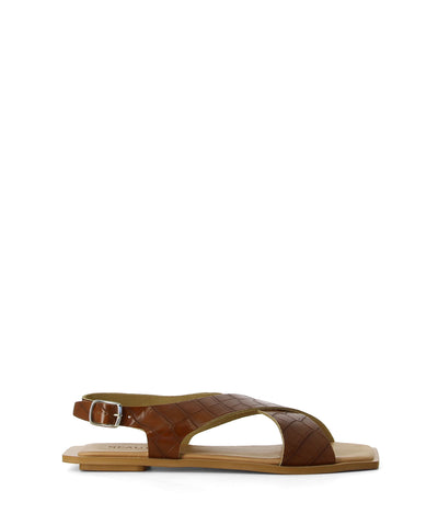 A tan strappy Italian leather sandal with an ankle strap, crossover front straps, a soft square toe and croc-like leather detailing by Beau Coops.