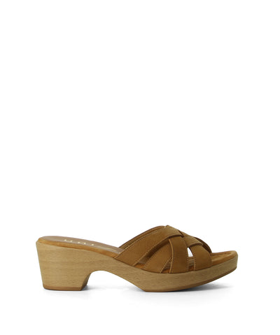 A woven brown suede slip-on mule that features a woven strap detail, wooden-look platform heel, and a round toe by Unisa.
