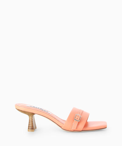 Coral leather mules with buckle detail over the strap, an hourglass kitten heel and a square toe.