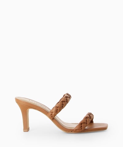 Brown leather heels with two braided leather straps, a slender heel and a soft square toe.
