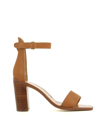 A simple tan heeled sandal by Diavolina. The 'Kano' features a Velcro ankle strap and a soft square toe.