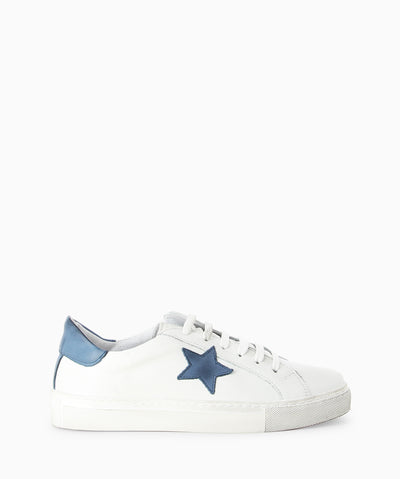 White leather sneakers with blue star detail, distressed rubber sole and a round toe.