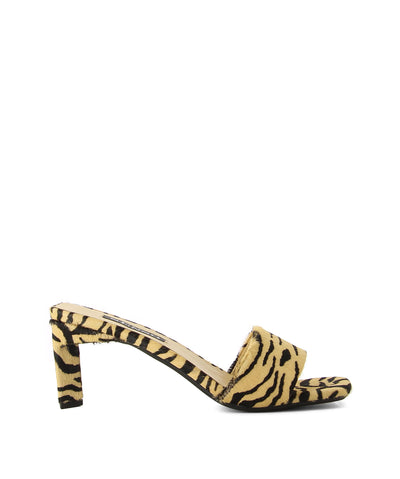Pony hair animal print mules with architectural heel by Senso.