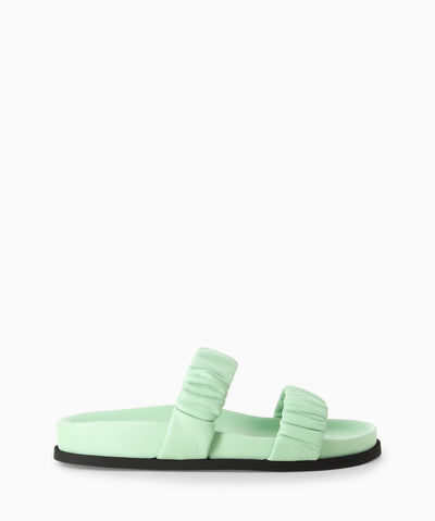 Seafoam green leather sandals with two ruched leather straps, a moulded footbed and a round toe. 