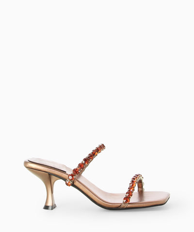Brown metallic mules with diamanté embellished straps, an hourglass heel and an open square toe.