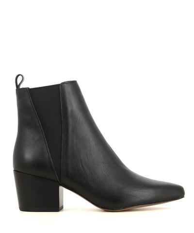 A black leather Chelsea style ankle boot that features triangle shaped elastic gussets, a mid 5.5cm block heel and a pointed toe by Diavolina.