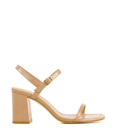 A chic and simple nude patent leather strappy sandal by 2 Baia Vista. The 'Ronnie' has a gold buckle fastening and features a block heel and a square toe.
