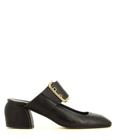 A mule featuring an oversize instep gold buckle and a square toe.
