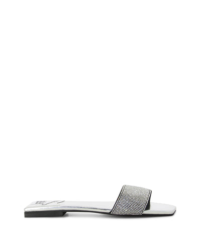 Silver metallic leather slides featuring a single diamanté embossed strap and a square toe by Jeffrey Campbell.