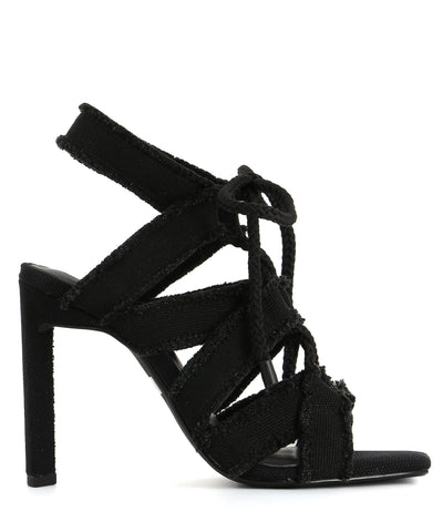 A high heeled black strappy sandal by Senso. The 'Sully' has a rope lace fastening and features a stiletto heel and a square toe.