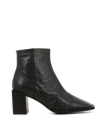 Chic black leather ankle boots featuring zipper fastenings, an asymmetrical top line, an architectural block heel and a square toe by 2 Baia Vista.