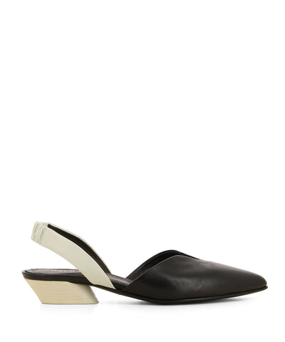 An Italian made black and white monochrome leather slingback with a low block heel and a pointed toe - hand made in Italy by Halmanera. This style runs true to size.